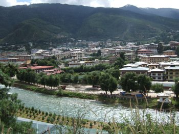 This photo of the center of Thimphu, the capital of Bhutan, was taken by photographer Christopher Fynn and is used courtesy of the Creative Commons Attribution ShareAlike 3.0 License.  (http://commons.wikimedia.org/wiki/File:Thimphu_view_080907.JPG)